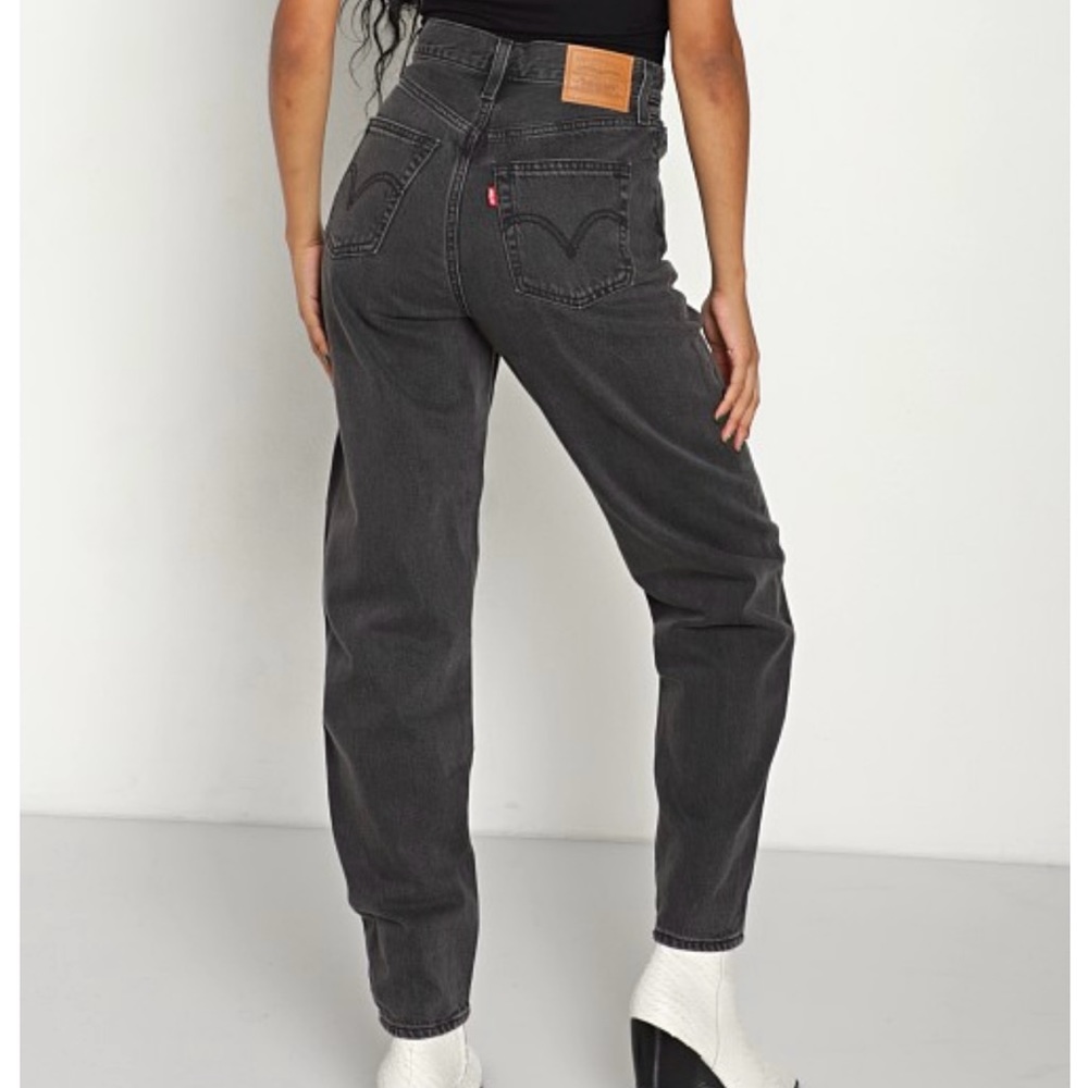 Levi’s black high waisted loose tapered jeans.